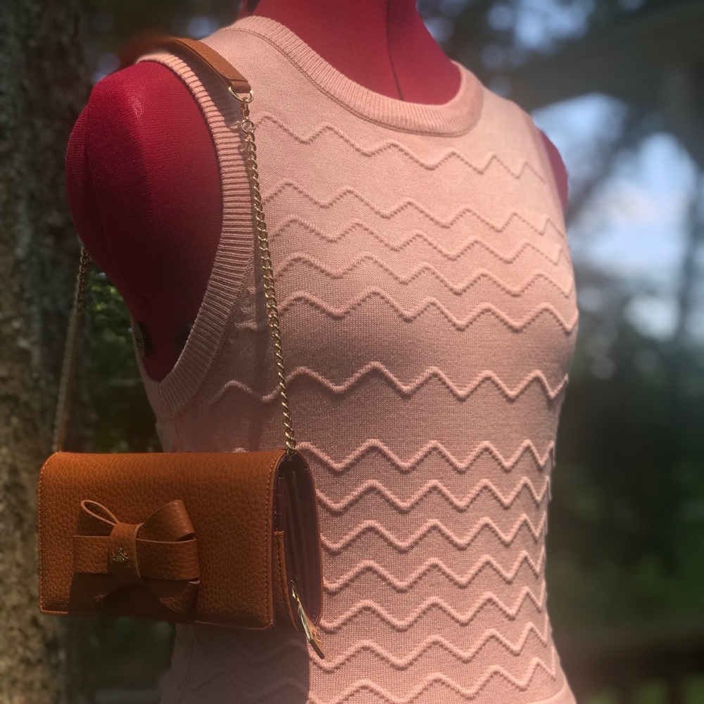 $59 Sleeveless sweater dress pale pink peach